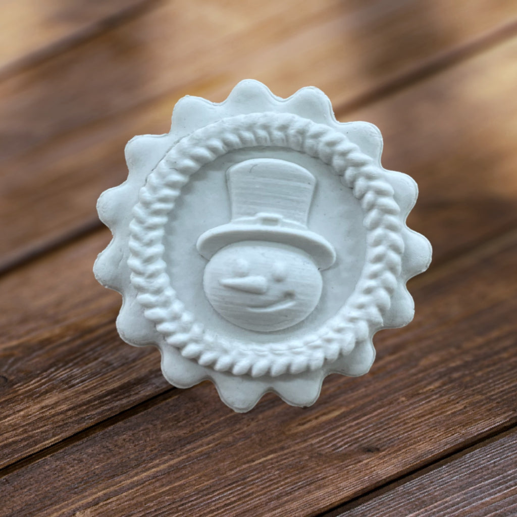 pequeña cabeza de muñeco de nieve