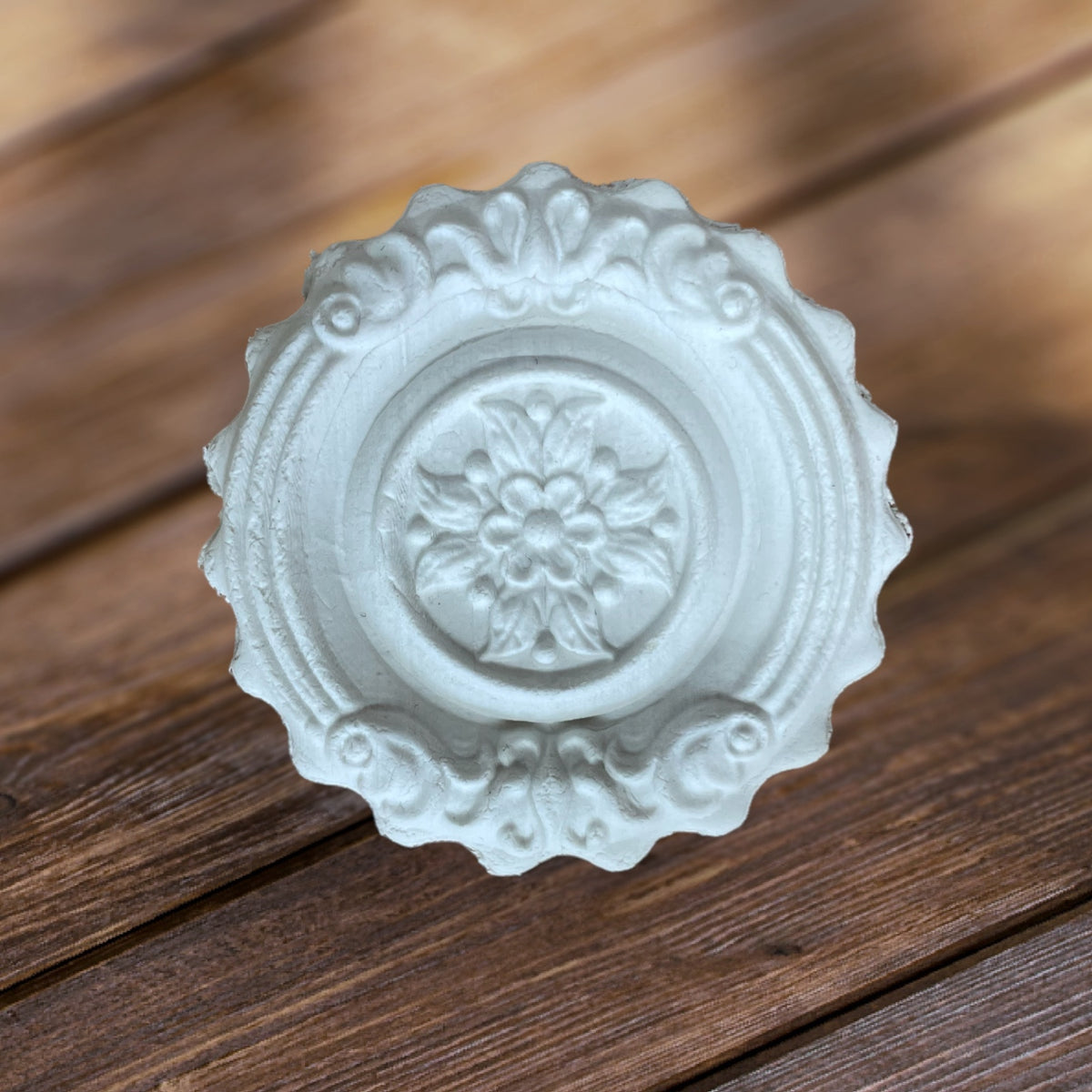 Ornament Blume im Kranz
