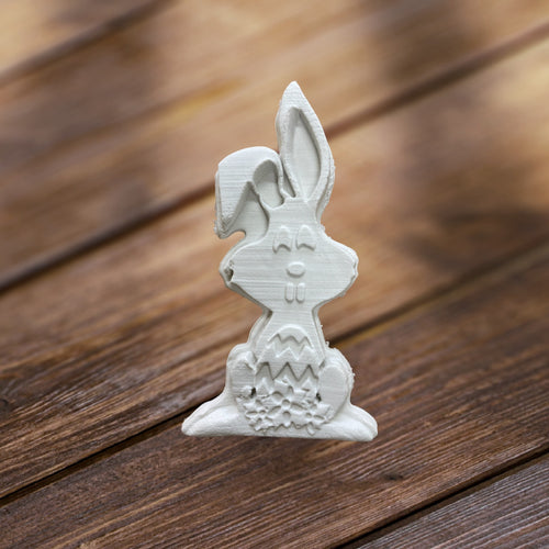 Bunny avec œuf de Pâques grand