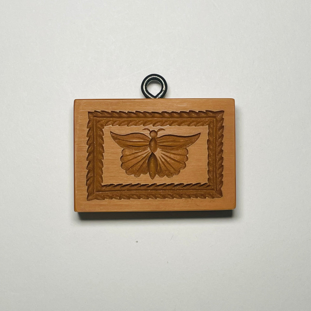 Schmetterling rechteckig mit Blattkranz