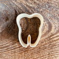 Cookie cutter laughing tooth